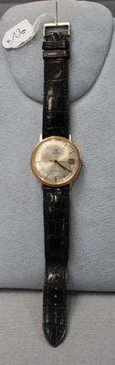 a watch that is sitting on top of a table
