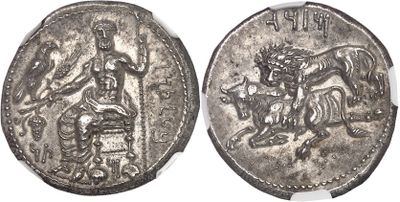 a silver coin with an image of a man on a horse