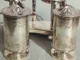 pair of antique silverplated salt and pepper shakers