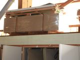boxes are stacked on top of each other in a room