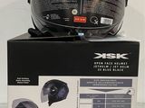 boxed picture of a helmet on top of a box on a table