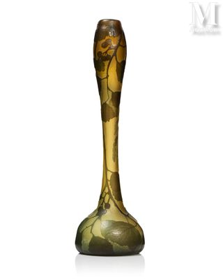 a vase that is sitting on a white surface