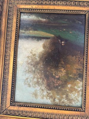 une photo d'un tableau représentant un ours, dans un cadre