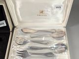 a box with a set of silverware in it