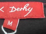 a label that says derby on it on a bag