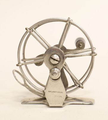 a metal fan that is sitting on top of a table