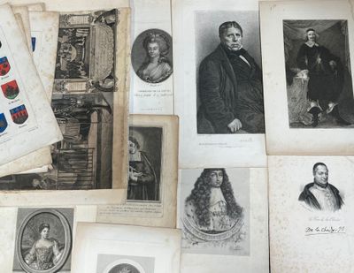 a lot of old photos of people on a table