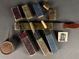 many different types of books and a knife on the table