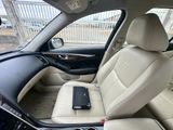 a cell phone sitting in the back seat of a car