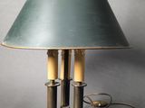 an image of a table lamp with two candles on it