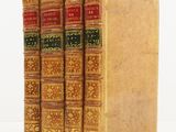 a set of three books sitting on top of each other