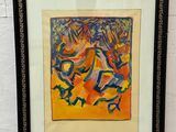 a painting of birds flying in the air in a black frame