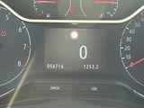 a close up of a car dashboard with a speedometer