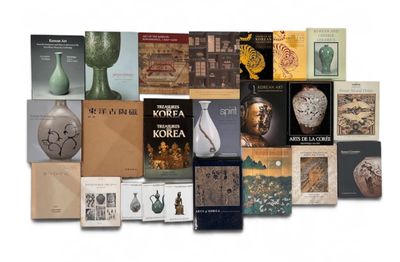 a lot of books that are sitting on a table