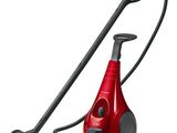 l'aspirateur rouge repose sur la surface blanche, avec un cordon noir
