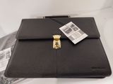 an image of a black briefcase with a tag on it