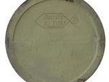 a close up of a metal plate with a logo on it