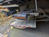an image of a truck that is parked on the side of the road