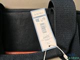 a black bag with a price tag on it