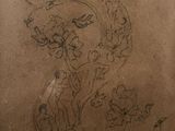 a drawing of a cat and a dog on a piece of paper
