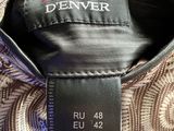 a close up of a label on a jacket that says denver