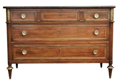 a wooden chest of drawers with brass handles and a marble top
