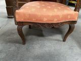 a chair that is sitting in the middle of a room
