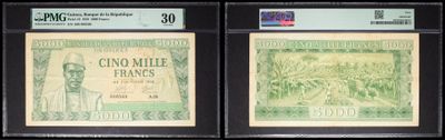 three different types of currency are on display in a display case