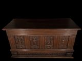 an old wooden chest with carvings and carvings on the sides