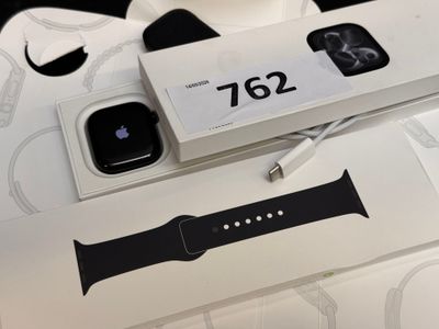 a box with an apple watch and an apple watch on top of it