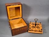 an image of a wooden box with a key inside of it