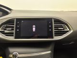 the dashboard of a car with a digital display in the center