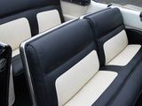 a black and white car with two seats in it