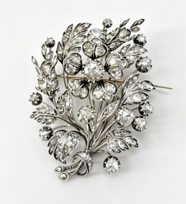 une image représentant une broche ornée d'un bouquet de fleurs