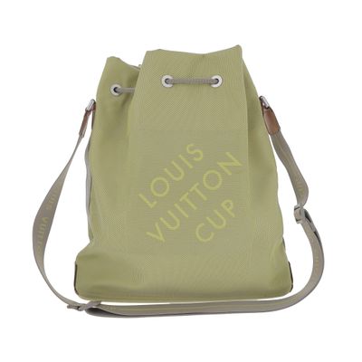 the bag is green and has a small logo on it