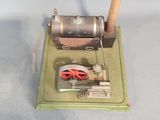 a small model of a steam engine sitting on a table