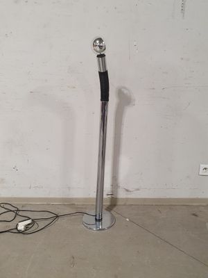 an image of a floor lamp with a speaker on it