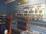 a picture of a room with a bunch of tools on the wall
