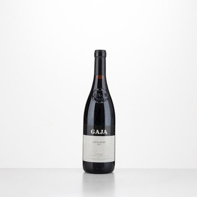 a bottle of wine that is sitting on a table