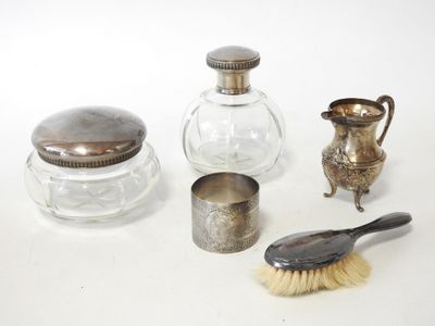 a lot of silver objects on a white surface