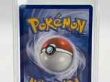a close up of a pokemon card in a plastic case