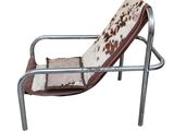 an image of a chair with a cow hide on it