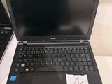 two laptops that are sitting on a table