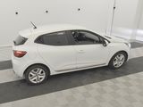 the white car is parked in the garage on the checkered floor