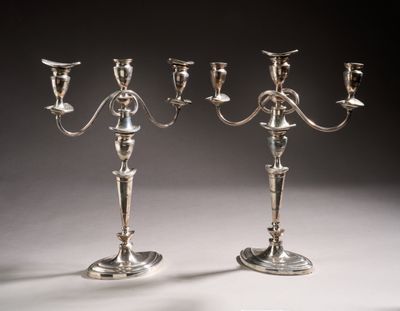 pair of silver plated candelabs with candlesticks