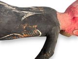 a black body with a red head and a black body with a red nose