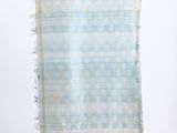 an image of a blue and white scarf hanging on a wall