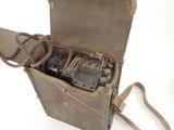 an old suitcase with a camera inside of it