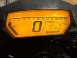 a close up of a motorcycle with a speedometer on it
