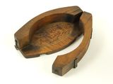 an image of a wooden object on a white surface